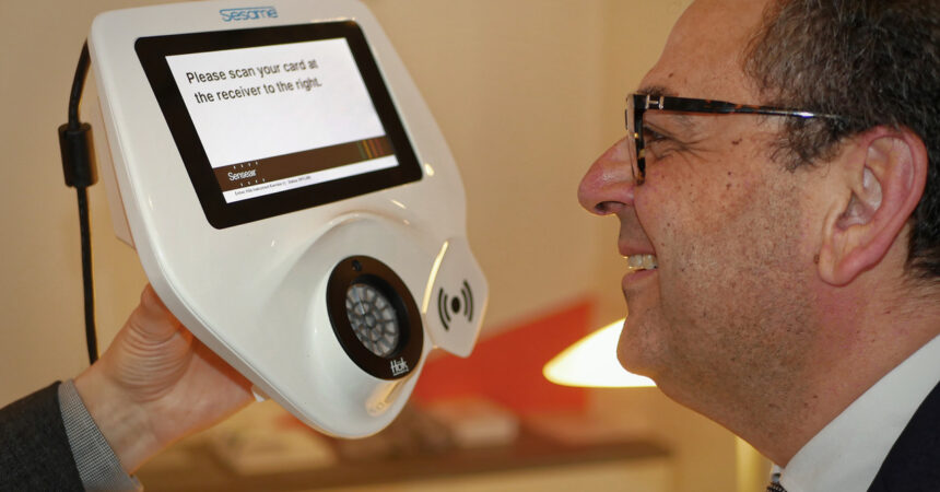 Mohamed Mezghani testing the Senseair touch-free alcolock.